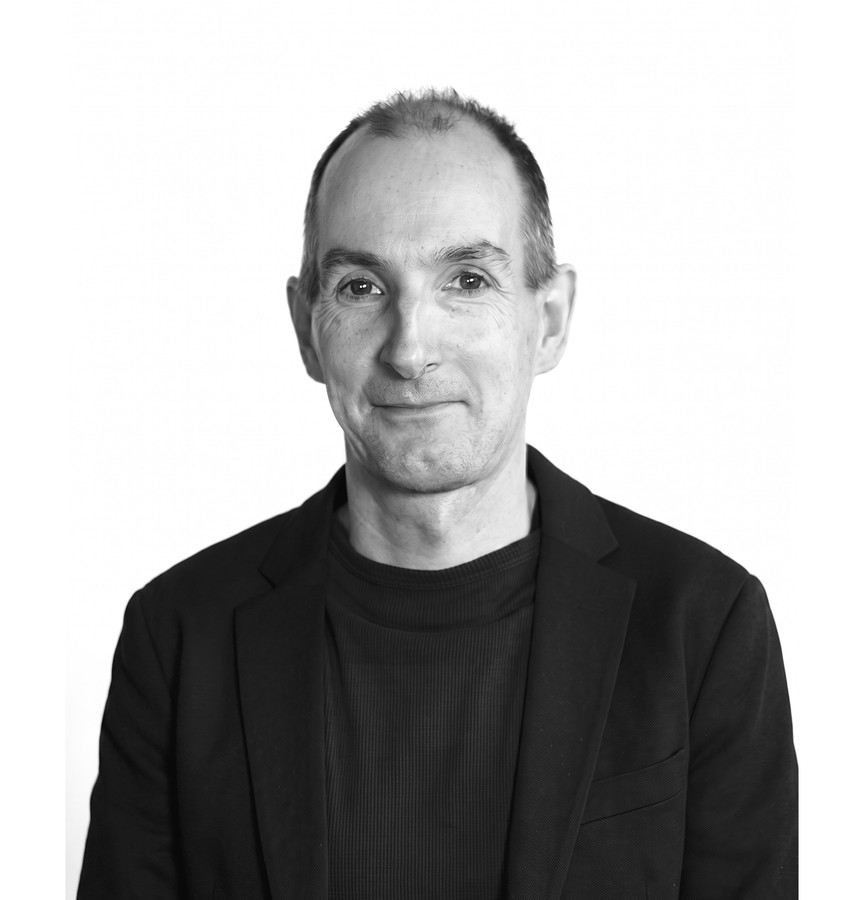 Black-and-white portrait of Richard Mitchell