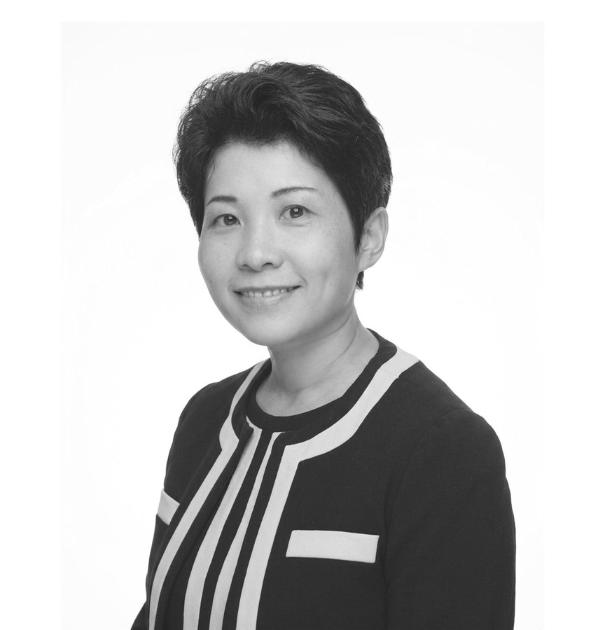 Black-and-white portrait of Xiaoqi Feng